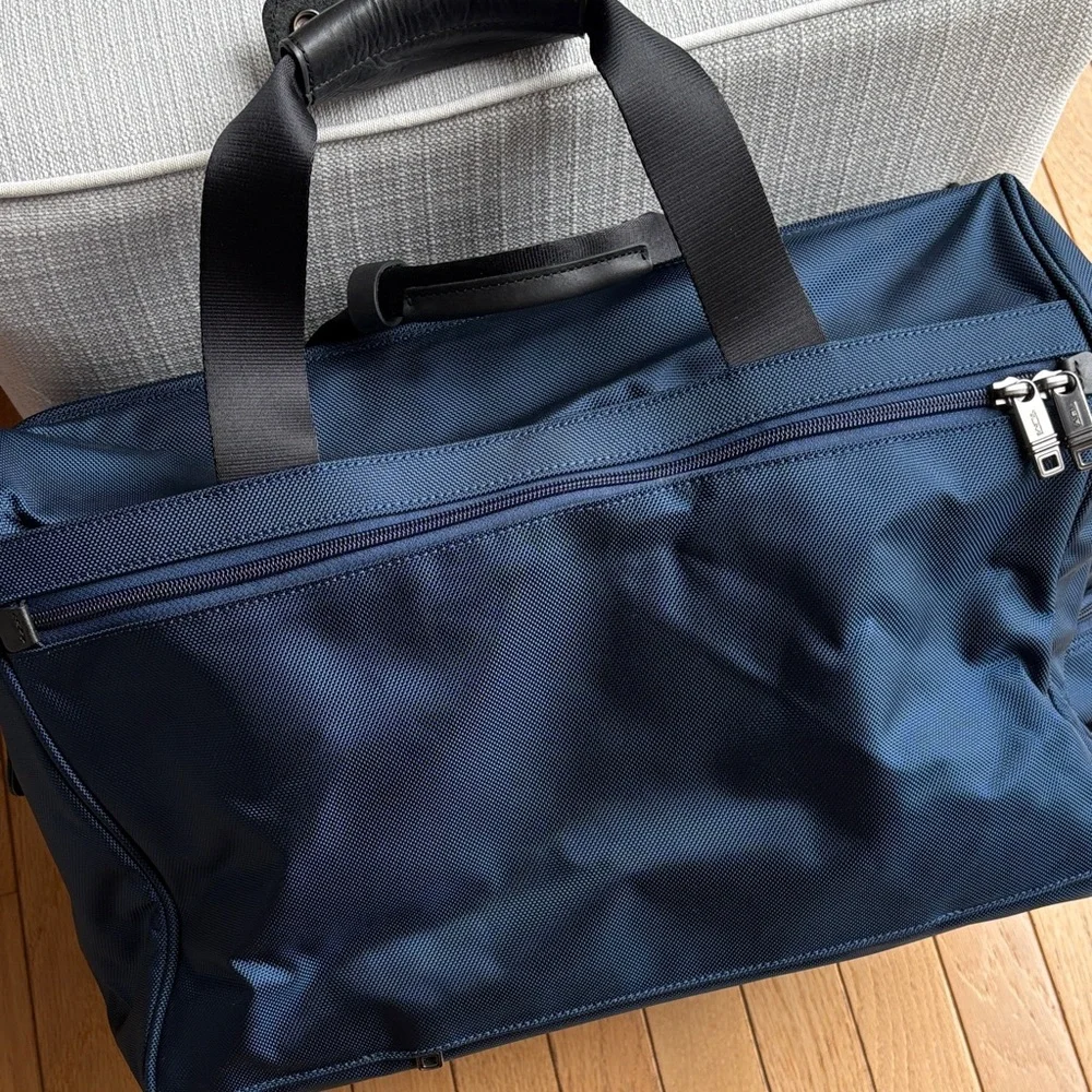 Tumi alpha deluxe carry on satchel in navy blue